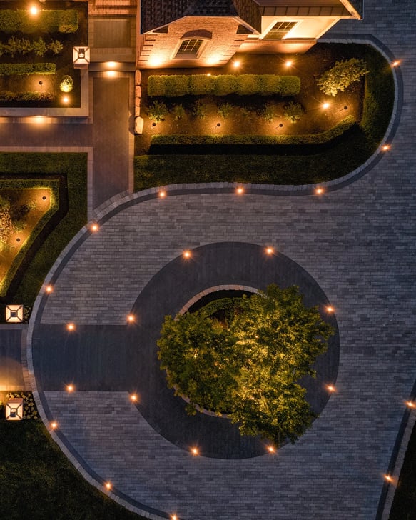 Driveway design with lighting and Techo-Bloc Linea pavers