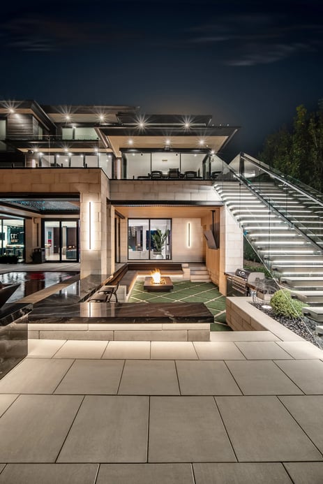 Modern backyard design with outdoor lighting