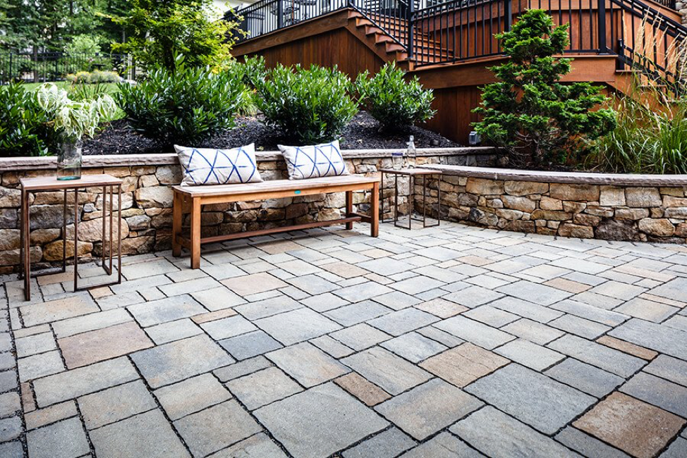 Breaking It Down Comparing Stamped Concrete vs. Pavers & Slabs