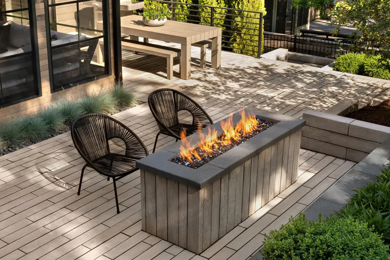 Backyard featuring Borealis slabs and a fire pit
