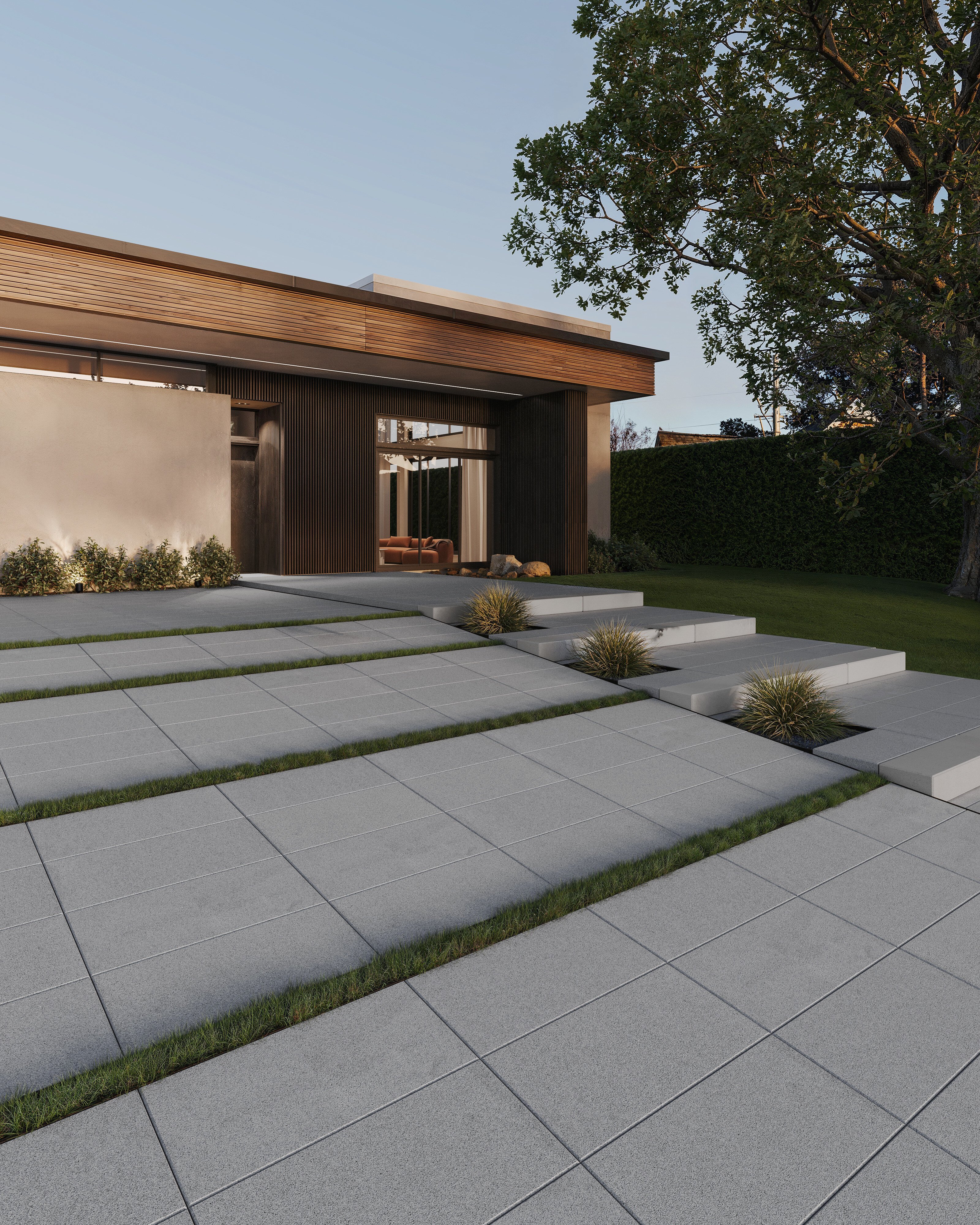 A modern driveway that features Techo-Bloc's Sleek paver in the color Silver Granite. 